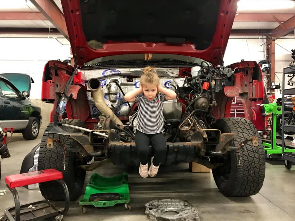 Kid in Truck at Schmidt Auto Care